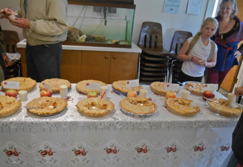 Chef Gerri Griswold, rear right, looks on as people sample her pies at White Memorial Conservation Center, Litchfield, Connecticut. (Bar Lois Weeks photo)